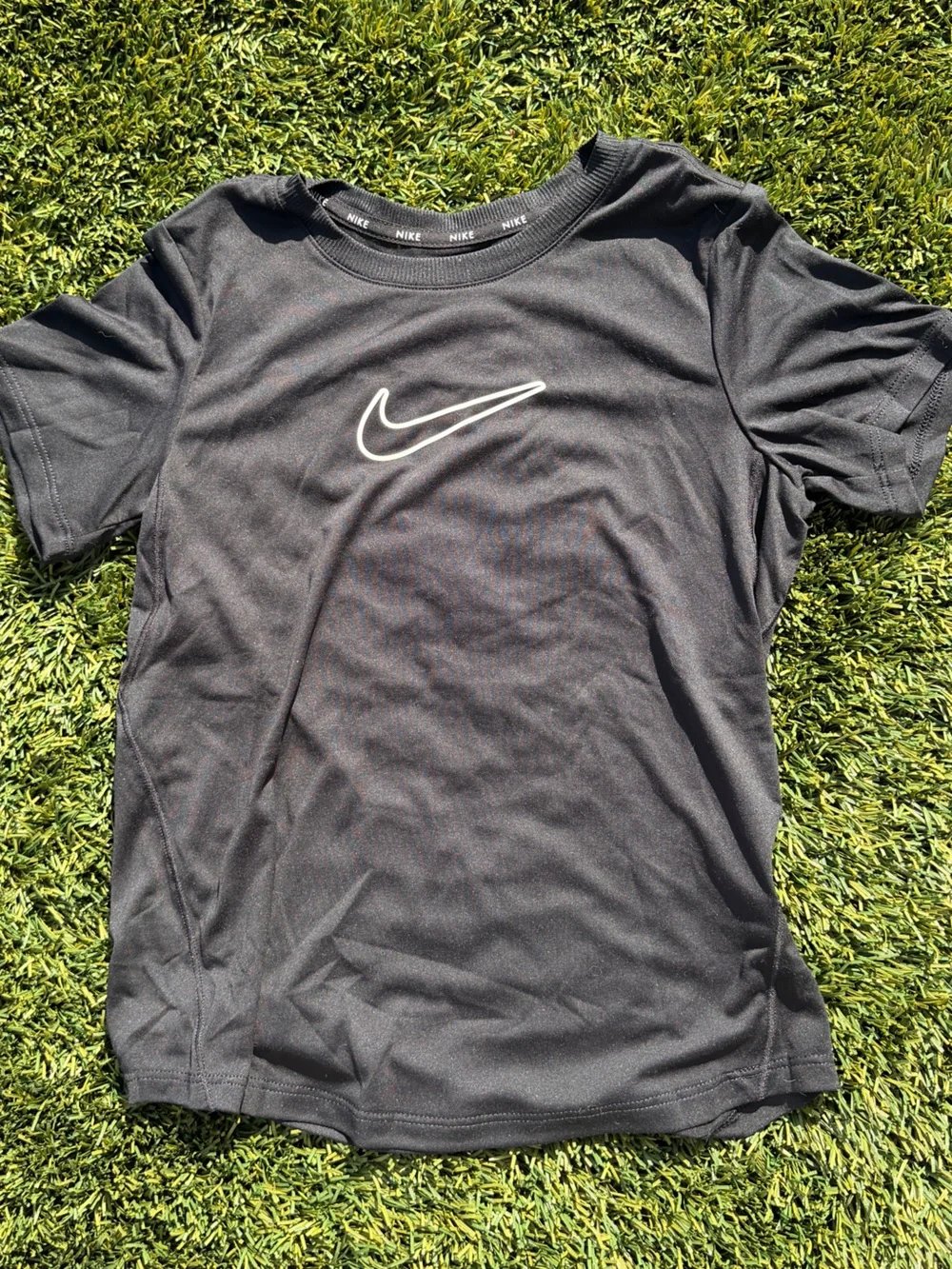 Nike Black Short Sleeve Athletic Tee with White Swoosh